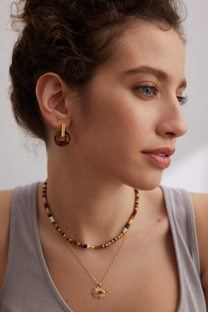 Assembled tiger’s eye disc earrings