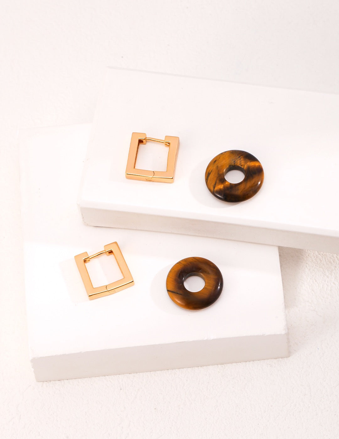 Assembled tiger’s eye disc earrings